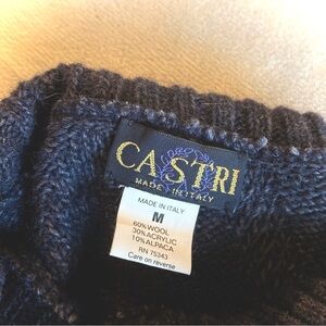 Castri Italian mens sweater. woven design on front and back. matching seams.